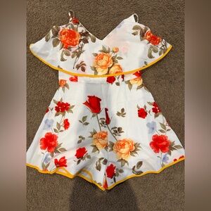 L'ATISTE Floral Romper with Red and Yellow Accents